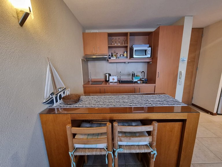 Encanto costero: depto. Bahía Pelícanos para 2